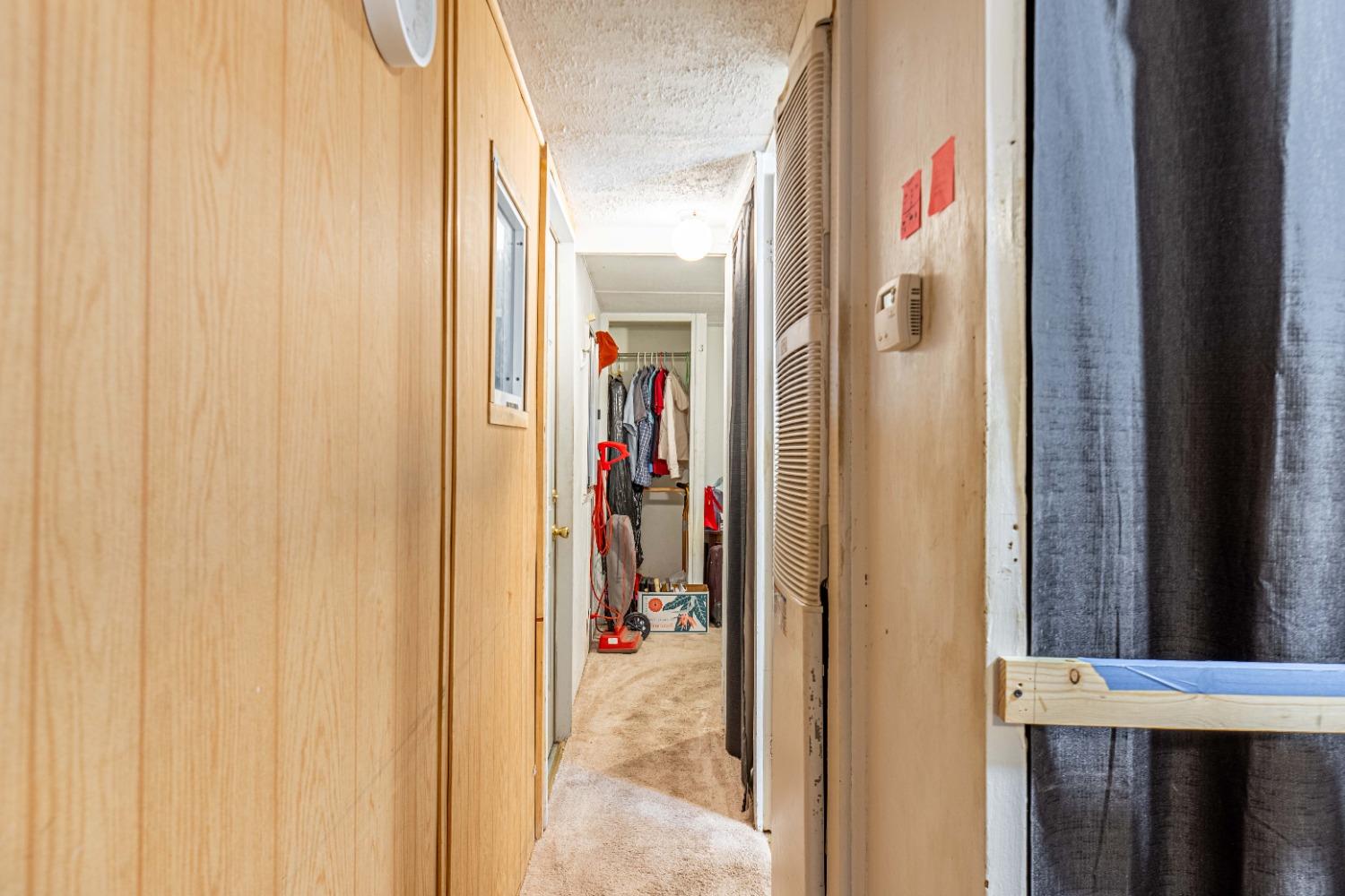 4449 South Carpenter Road, Unit D2 Modesto, CA 95358 - Photo 10 of 26 a view of a hallway with a elevator