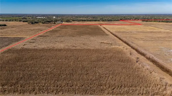a view of a swimming pool and an outdoor space