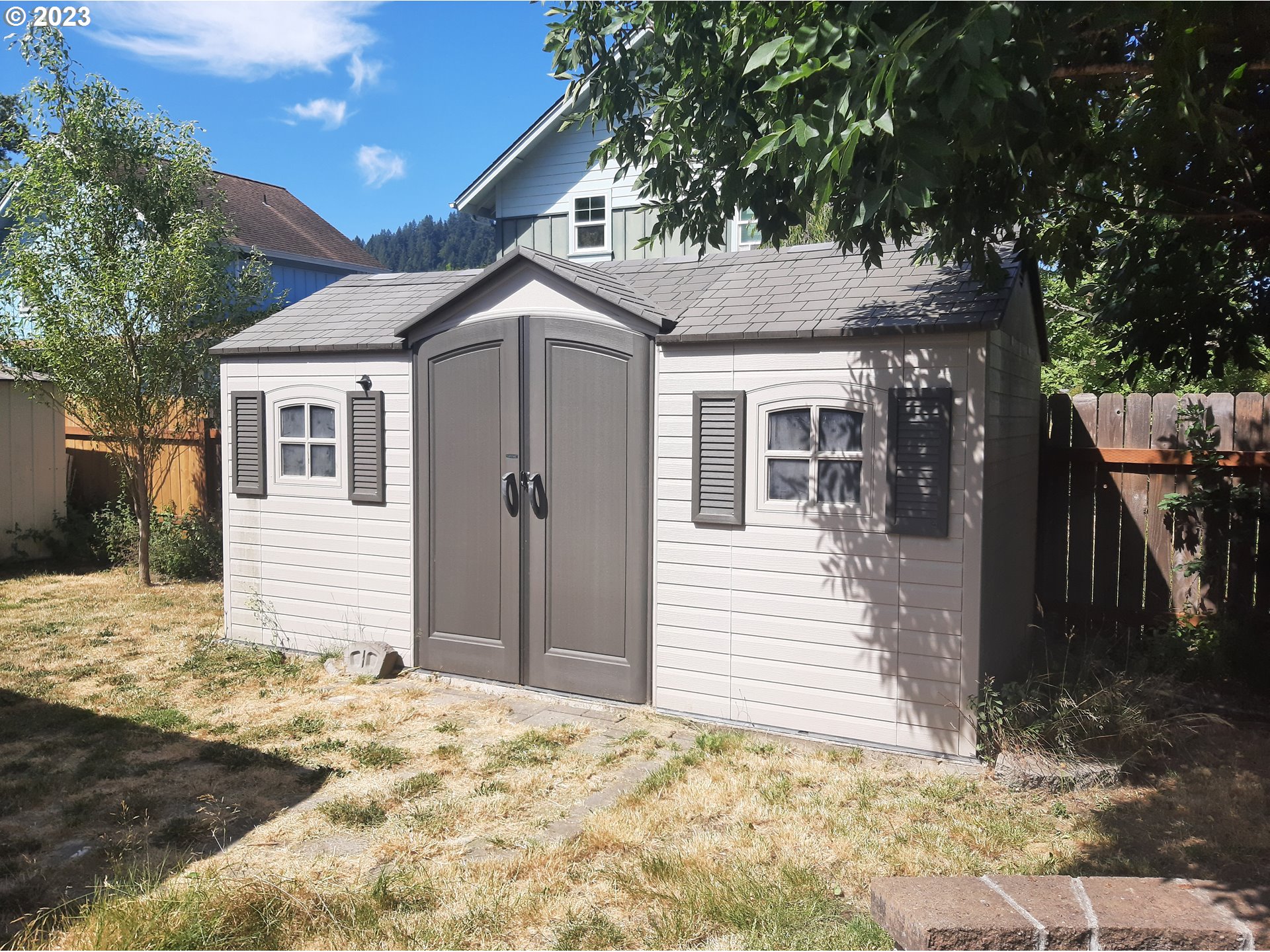 234 71st Street Springfield, OR 97478 - Photo 22 of 26 a front view of a house with a yard