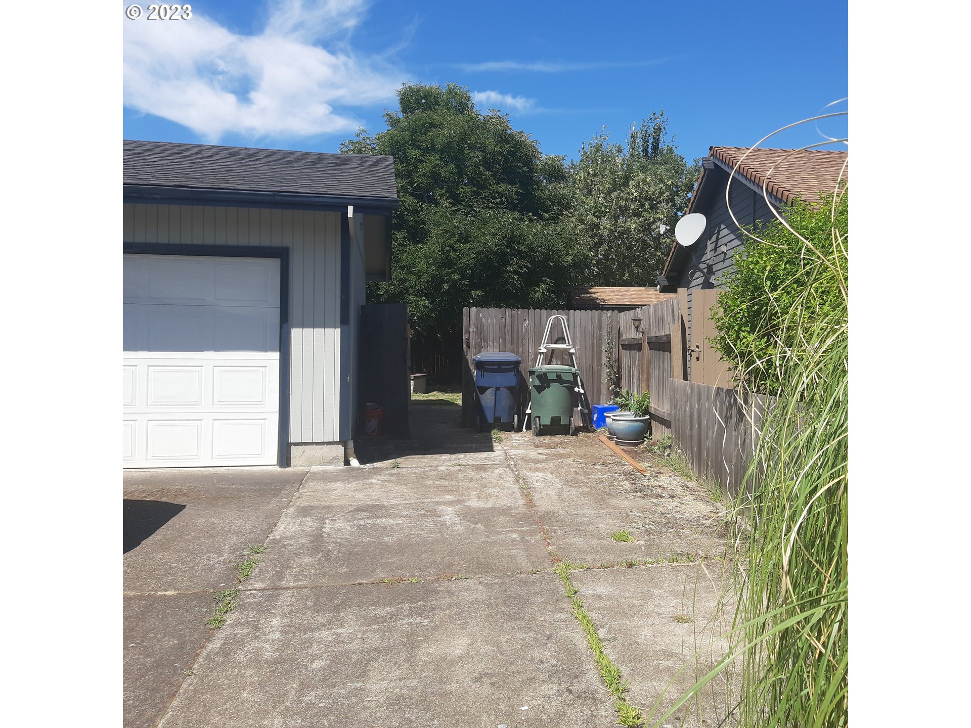 234 71st Street Springfield, OR 97478 - Photo 3 of 26 a view of a house with backyard and sitting area