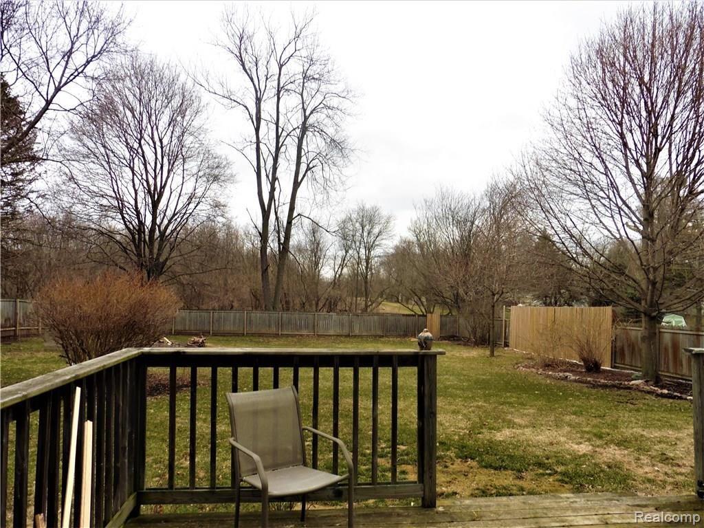 1400 West State Road Lansing, MI 48906 - Photo 2 of 12 robert back yard.jpg