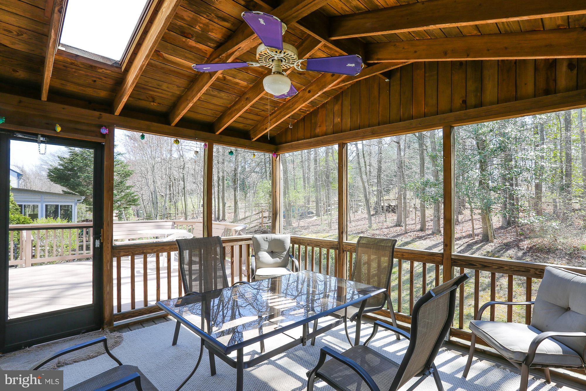 8609 Ashcroft Drive Laurel, MD 20708 - Photo 14 of 29 Screened in Porch with ceiling fan and light