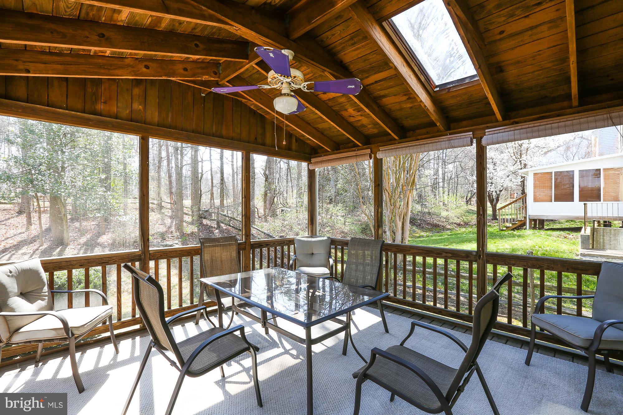 8609 Ashcroft Drive Laurel, MD 20708 - Photo 15 of 29 Screened in Porch with ceiling fan and light