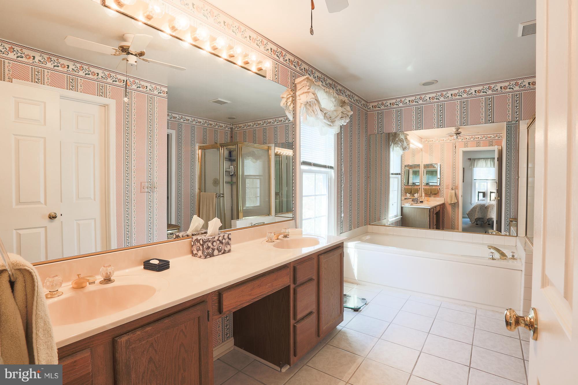 8609 Ashcroft Drive Laurel, MD 20708 - Photo 17 of 29 Master Bath with separate shower and tub