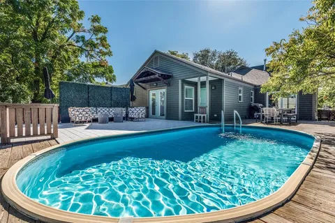 a view of a house with a yard patio