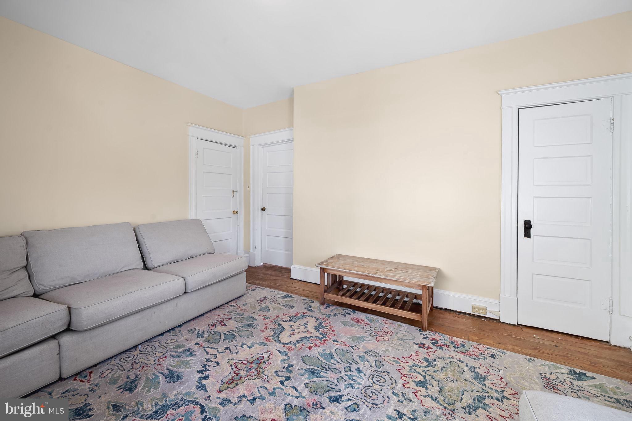 523 Orkney Road Baltimore, MD 21212 - Photo 29 of 40 a living room with furniture and a rug