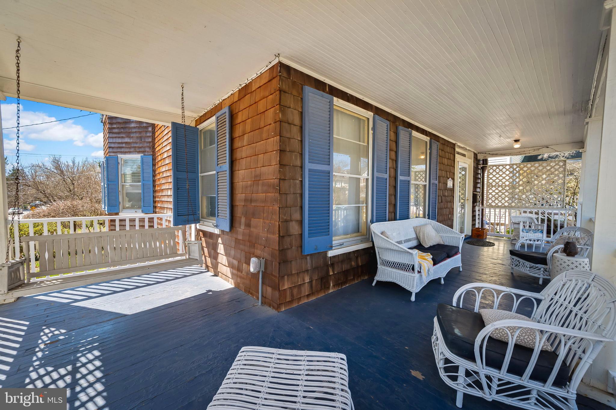 523 Orkney Road Baltimore, MD 21212 - Photo 5 of 40 a living room with furniture and a floor to ceiling window