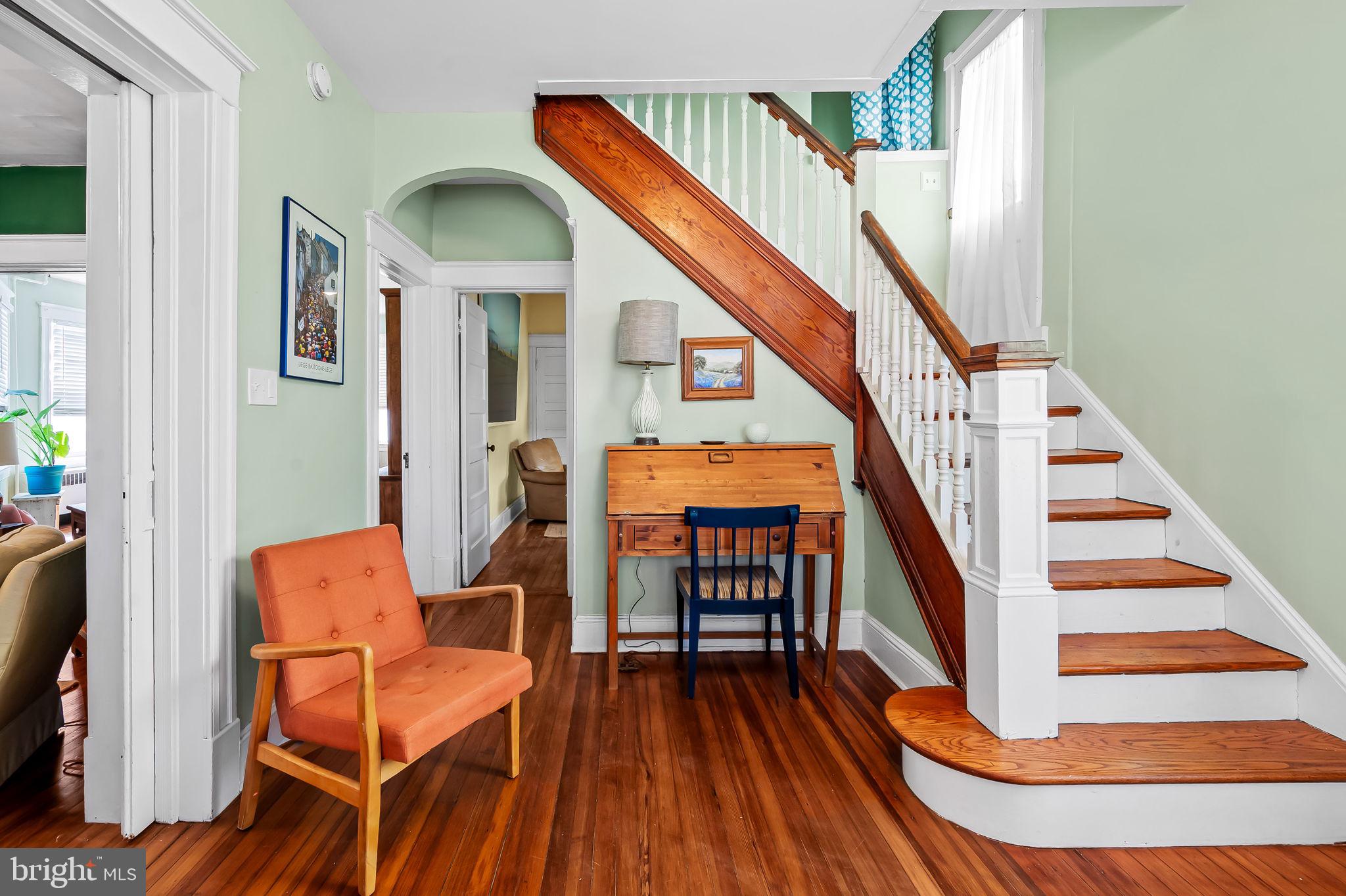 523 Orkney Road Baltimore, MD 21212 - Photo 6 of 40 a view of entryway and hall with wooden floor
