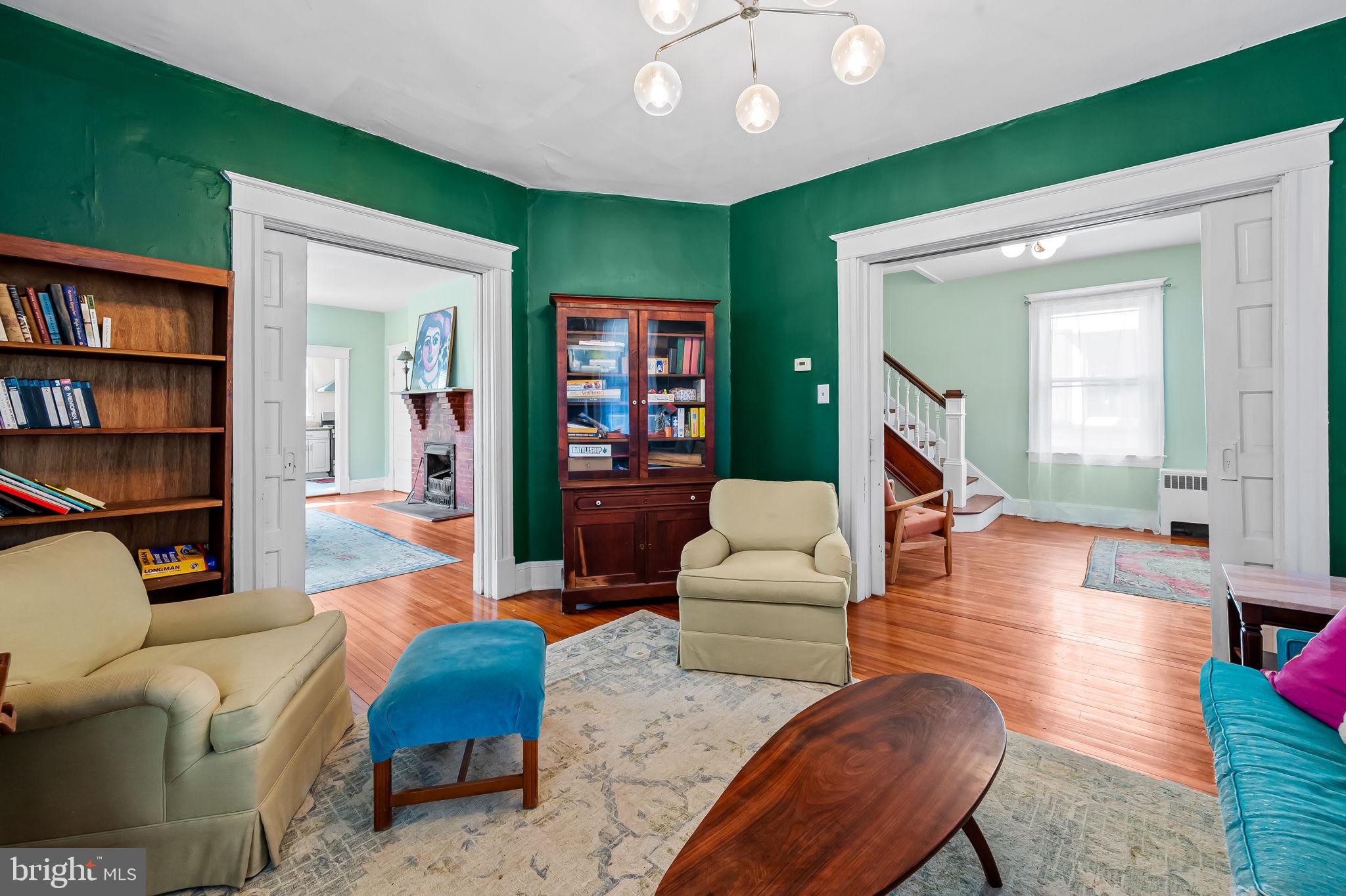 523 Orkney Road Baltimore, MD 21212 - Photo 9 of 40 a living room with furniture and a wooden floor