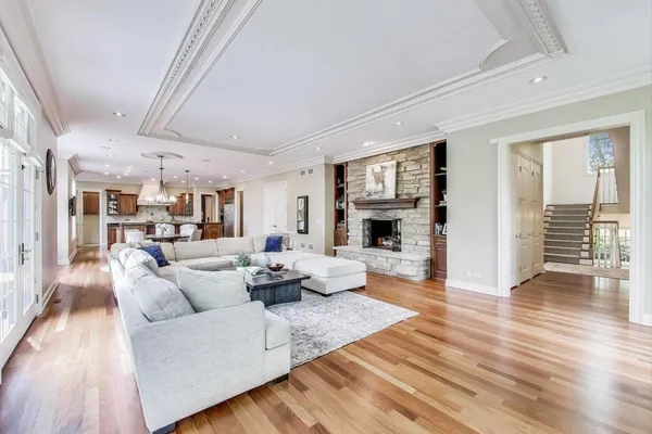 a living room with furniture and a rug