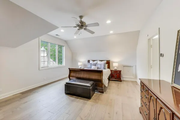 a view of a patio with couches table and chairs and potted plants