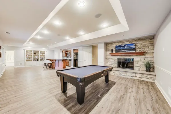 a view of a swimming pool with a patio