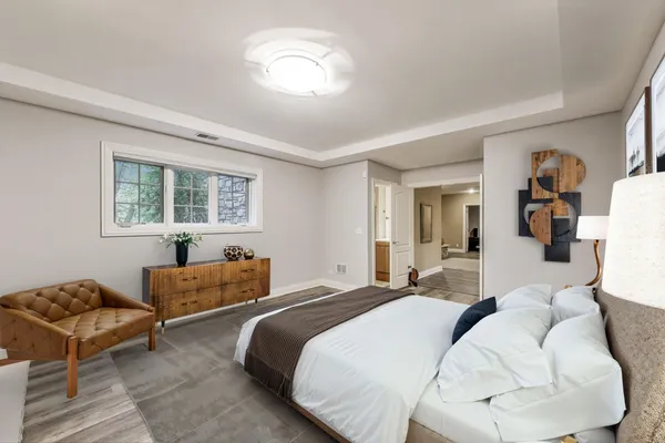 an aerial view of a house with a yard basket ball court and outdoor seating