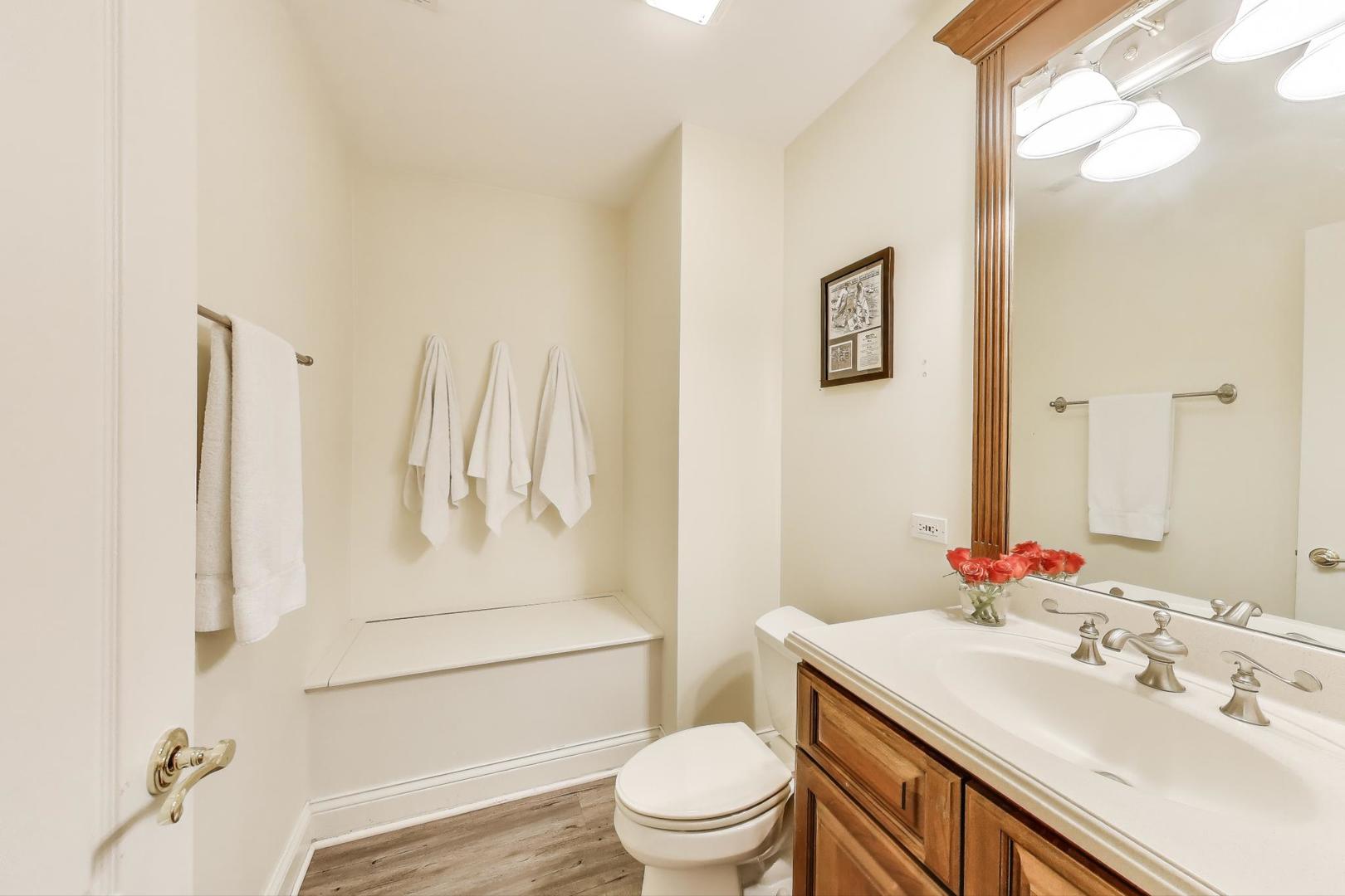 20580 West High Ridge Drive Kildeer, IL 60047 - Photo 54 of 69 a bathroom with a sink a toilet and shower