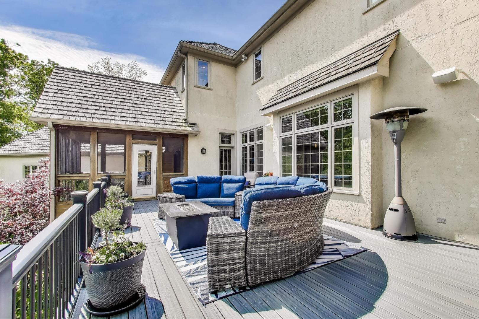 20580 West High Ridge Drive Kildeer, IL 60047 - Photo 56 of 69 a view of a patio with couches table and chairs and potted plants