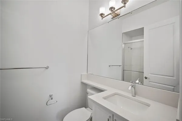 a view of an empty room with a ocean view