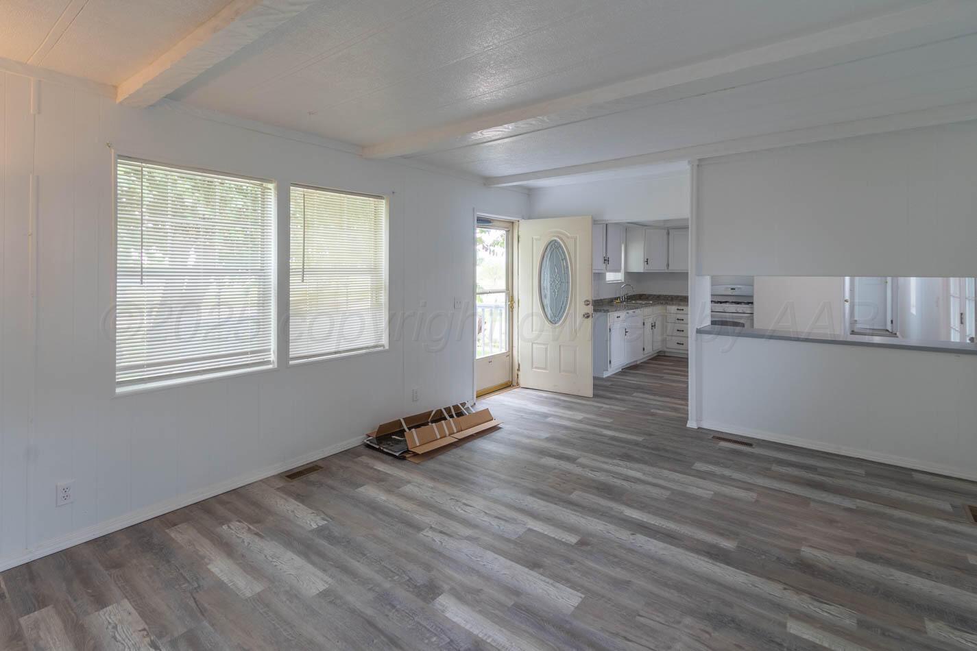201 Michael Drive Fritch, TX 79036 - Photo 13 of 19 a view of kitchen and wooden floor