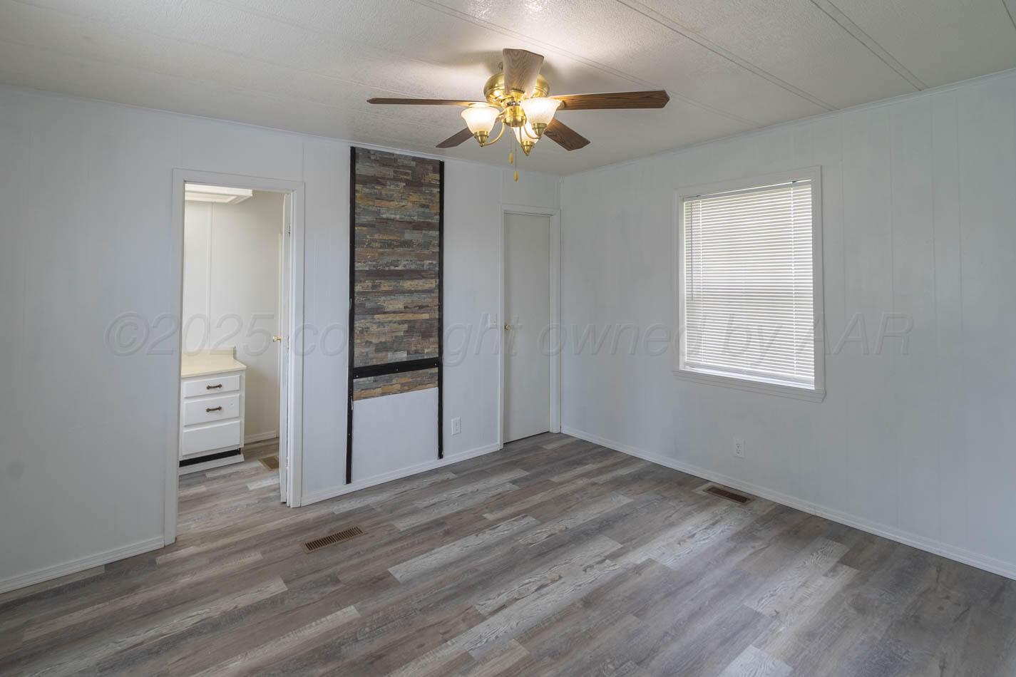 201 Michael Drive Fritch, TX 79036 - Photo 14 of 19 a view of an empty room with a window