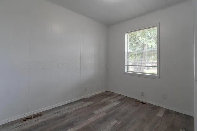 an empty room with a window