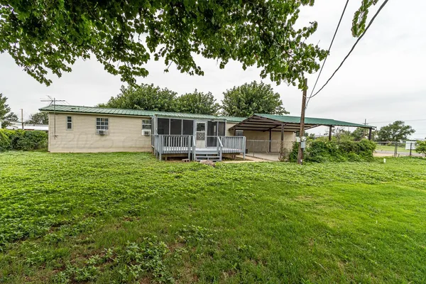 a house view with a garden space