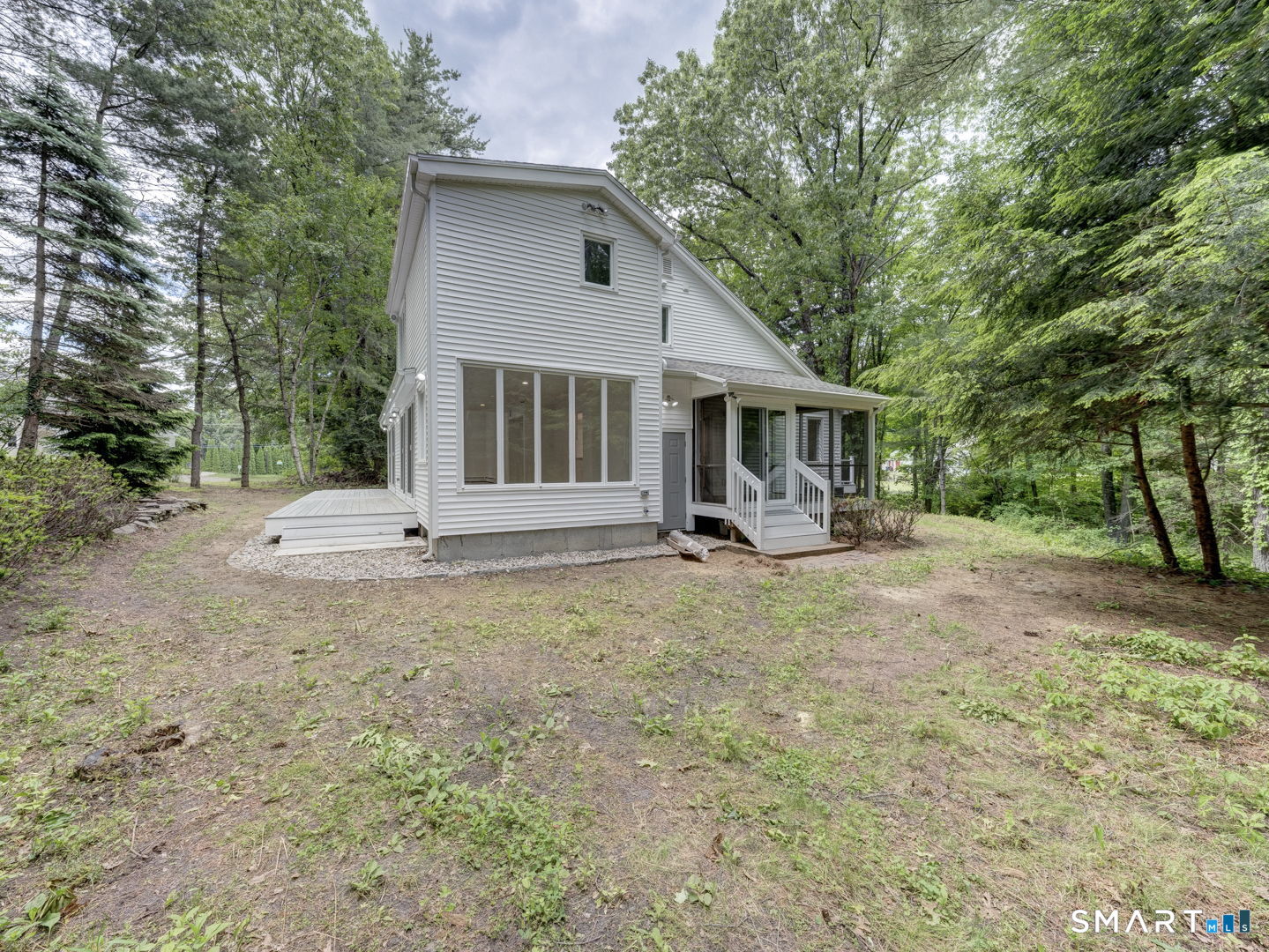 243 Brickyard Road Farmington, CT 06032 - Photo 6 of 34 Exit from Screen Porch to large side yard