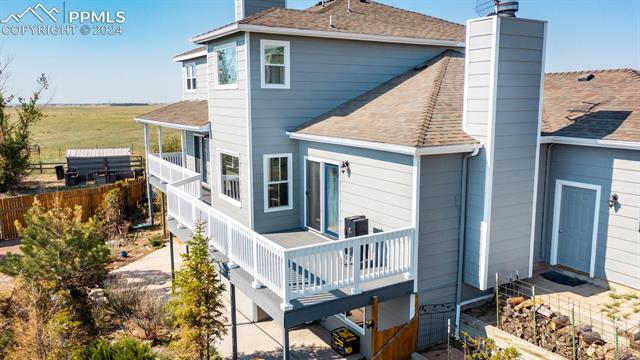 11125 Eureka Road Calhan, CO 80808 - Photo 6 of 44 Back of house featuring a deck