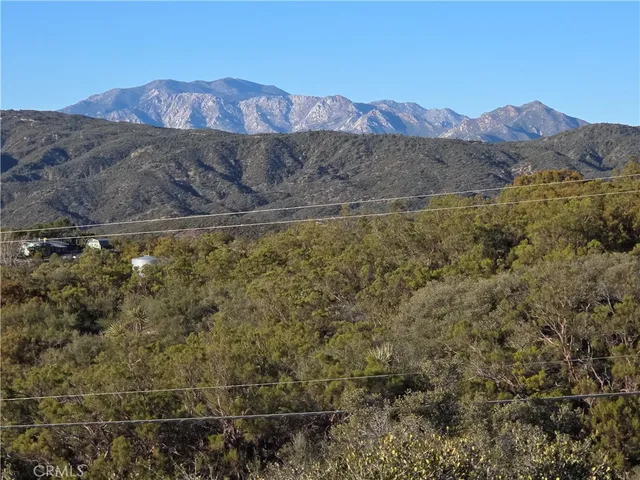 a view of a house with a mountain view