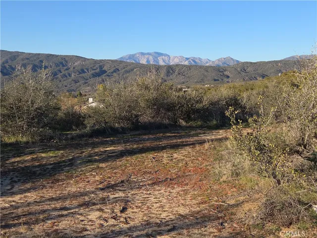 a view of backyard with mountain view