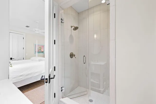 a bathroom with a bathtub and a shower
