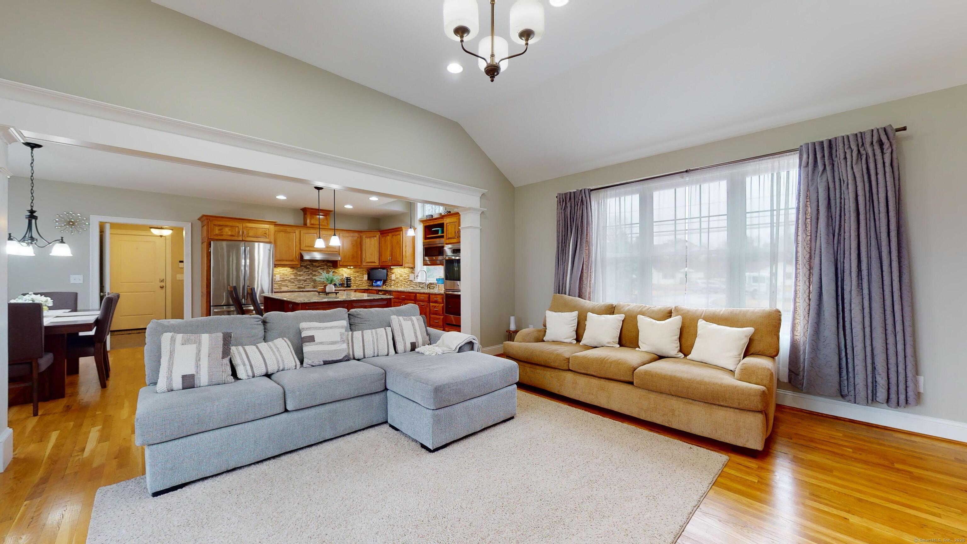 1012 Maple Street Rocky Hill, CT 06067 - Photo 7 of 31 a living room with furniture and a large window