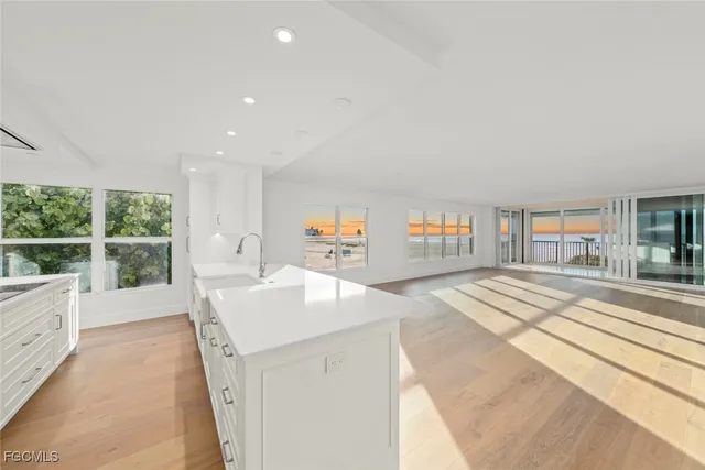 a kitchen with sink and window