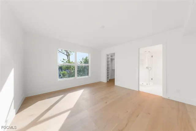 a bathroom with a sink vanity and a mirror