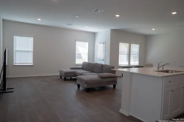 a living room with furniture and window