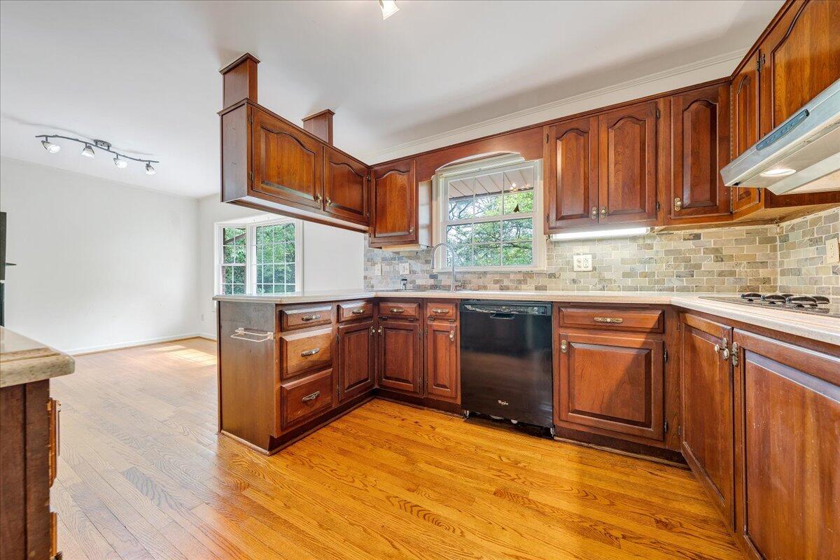 3534 Wedgewood Road Southwest Roanoke, VA 24018 - Photo 13 of 53 a kitchen with stainless steel appliances granite countertop a stove a sink and a microwave