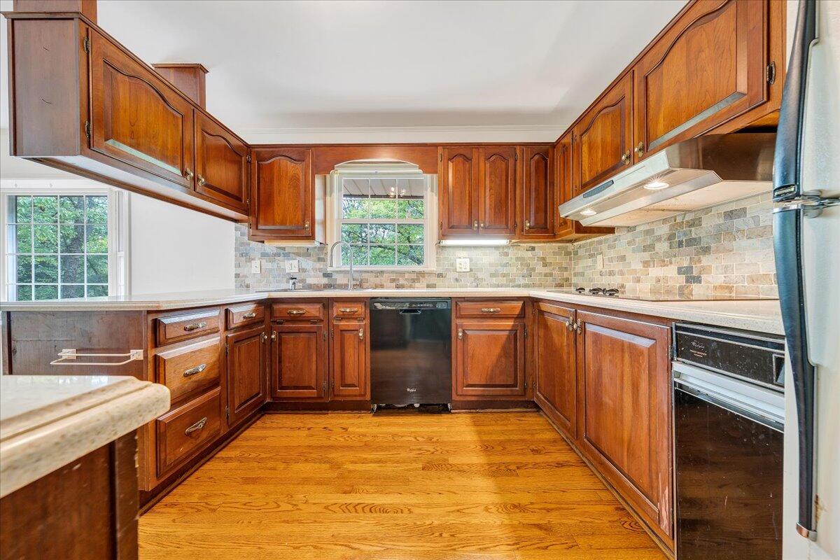 3534 Wedgewood Road Southwest Roanoke, VA 24018 - Photo 14 of 53 a kitchen with stainless steel appliances granite countertop a stove a sink and a microwave