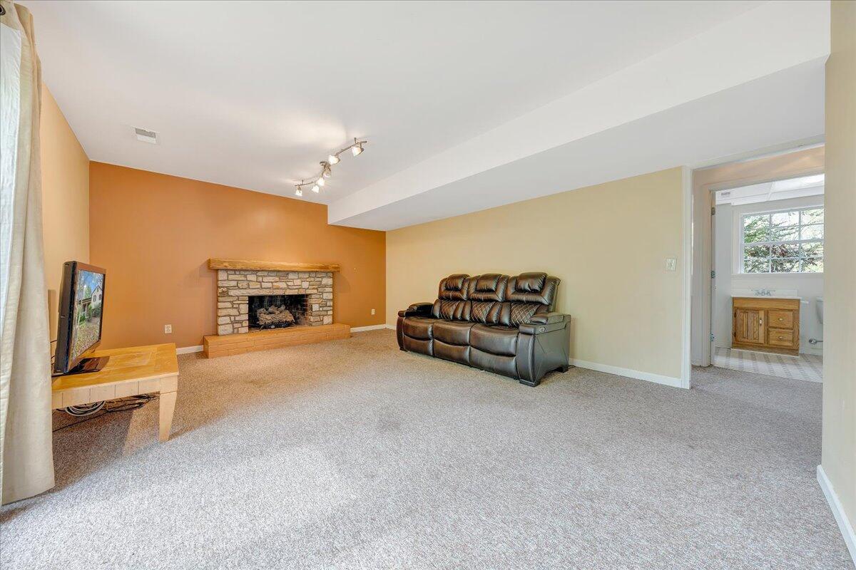 3534 Wedgewood Road Southwest Roanoke, VA 24018 - Photo 25 of 53 a living room with furniture and a fireplace