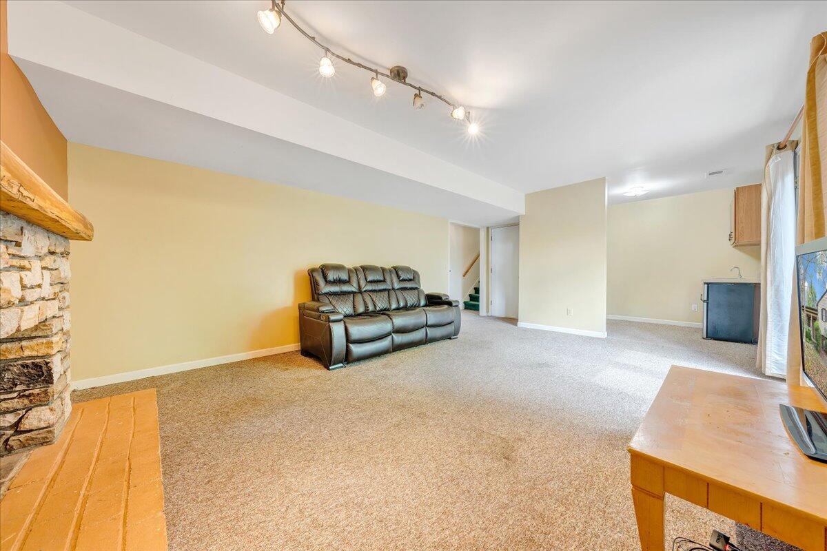 3534 Wedgewood Road Southwest Roanoke, VA 24018 - Photo 26 of 53 a living room with furniture and a flat screen tv