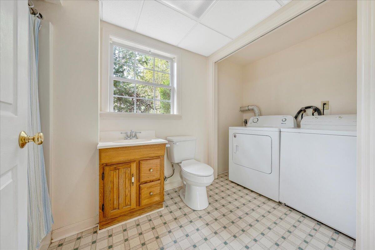 3534 Wedgewood Road Southwest Roanoke, VA 24018 - Photo 31 of 53 a bathroom with a sink toilet and window