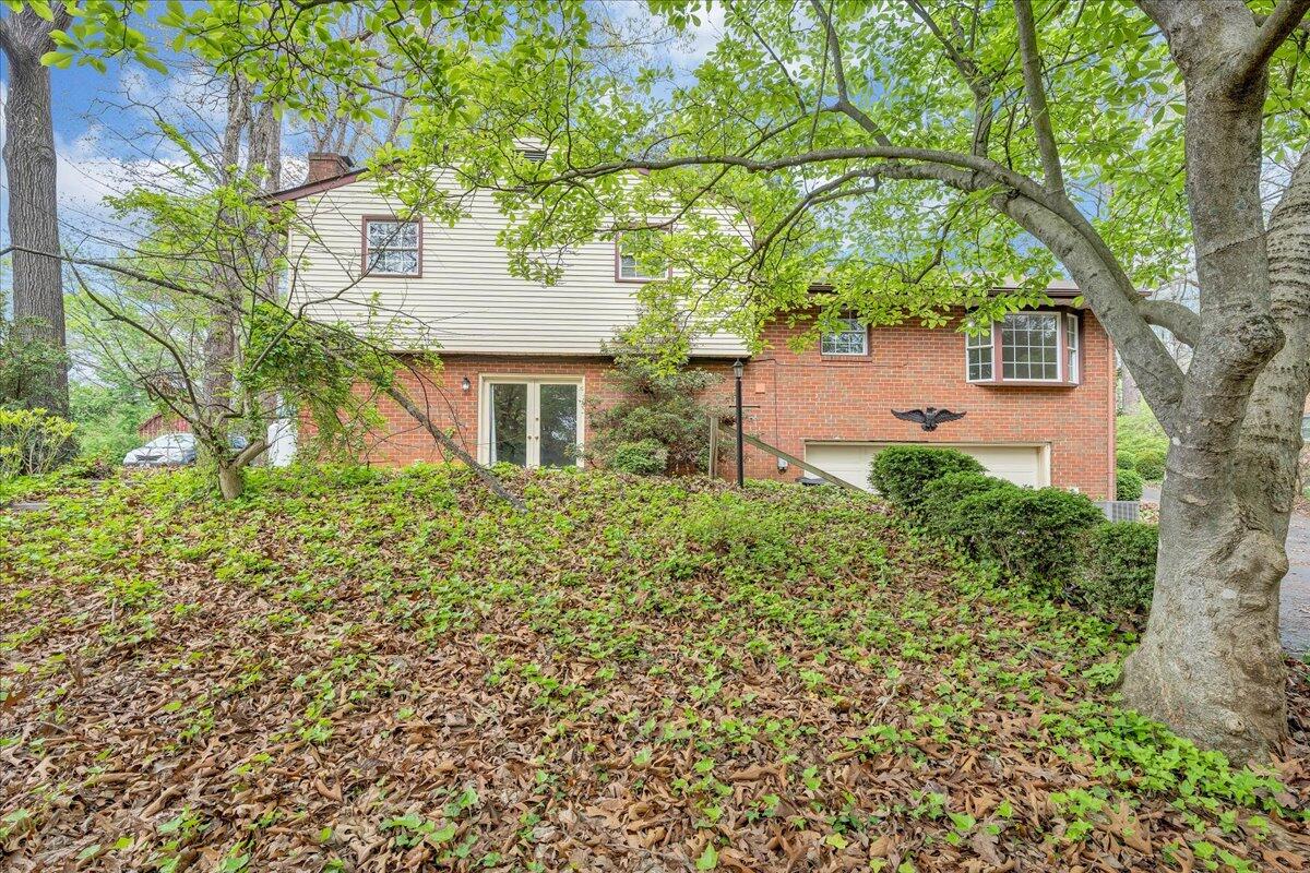 3534 Wedgewood Road Southwest Roanoke, VA 24018 - Photo 34 of 53 front view of a house with a large tree