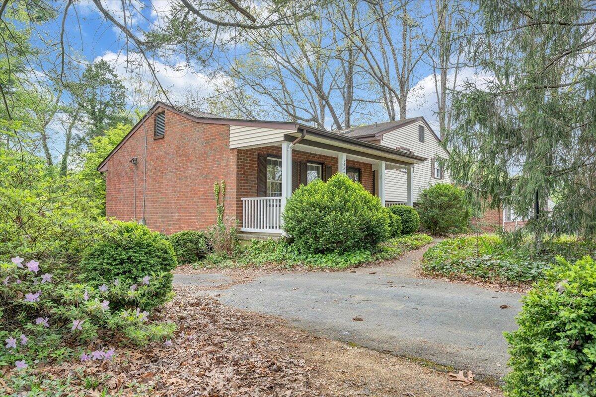 3534 Wedgewood Road Southwest Roanoke, VA 24018 - Photo 39 of 53 a front view of a house with garden