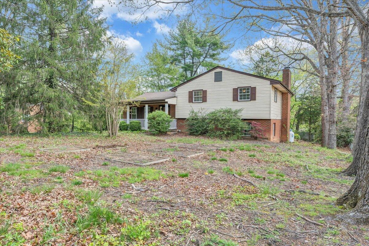 3534 Wedgewood Road Southwest Roanoke, VA 24018 - Photo 43 of 53 a view of a house with yard and a garden