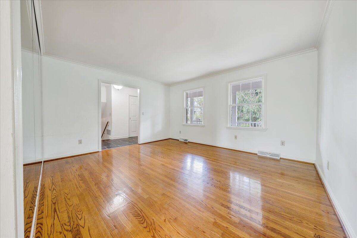 3534 Wedgewood Road Southwest Roanoke, VA 24018 - Photo 5 of 53 a view of empty room with wooden floor and fan