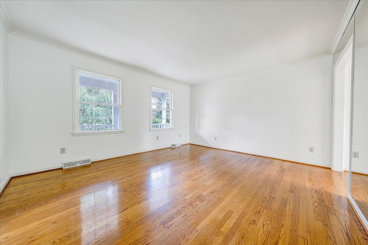 3534 Wedgewood Road Southwest Roanoke, VA 24018 - Photo 8 of 53 an empty room with wooden floor and windows