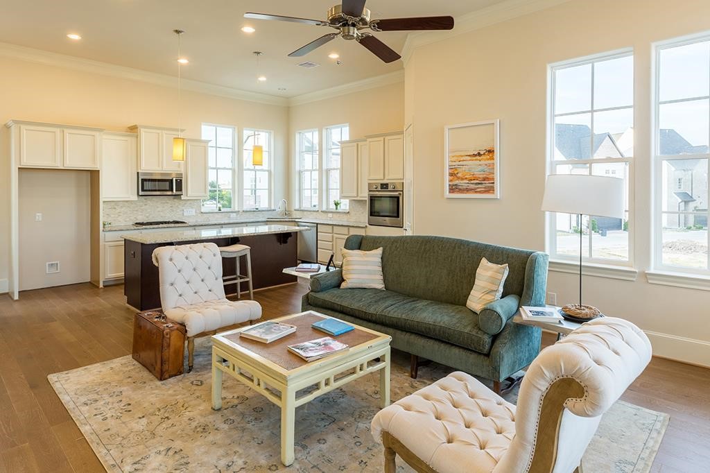 9546 London Bridge Station Houston, TX 77045 - Photo 12 of 41 The second-level living/family room is bathed in simple natural light, complemented by the warm earth tones of the walls and floors, offering tremendous wall and floor space. This fully lined common area and central chef's kitchen are the heart of the home.