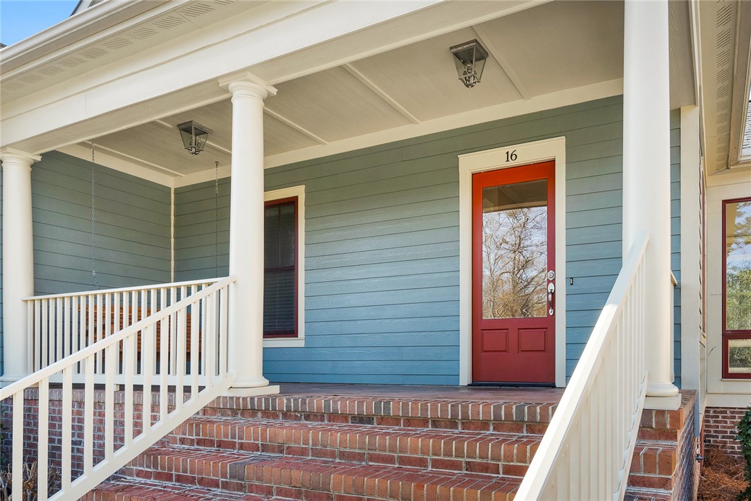 16 Oleander Drive Anderson, SC 29621 - Photo 2 of 37 A welcoming brick staircase leads to a charming front porch, perfect for relaxing.