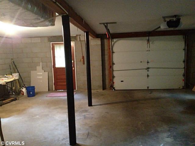 12801 South Chester Road Chester, VA 23831 - Photo 13 of 20 Basement - One car, basement, auto garage door. Room for a shop/storage.
