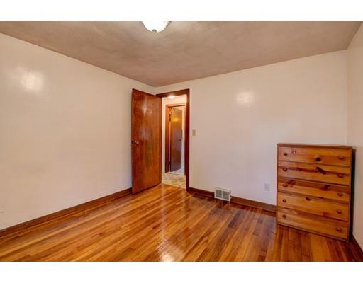 84 Campechi Street Springfield, MA 01104 - Photo 13 of 26 a view of empty room with wooden floor