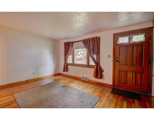 84 Campechi Street Springfield, MA 01104 - Photo 4 of 26 a view of an empty room and window