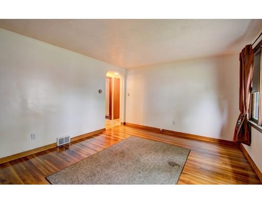 84 Campechi Street Springfield, MA 01104 - Photo 5 of 26 a view of an empty room and wooden floor