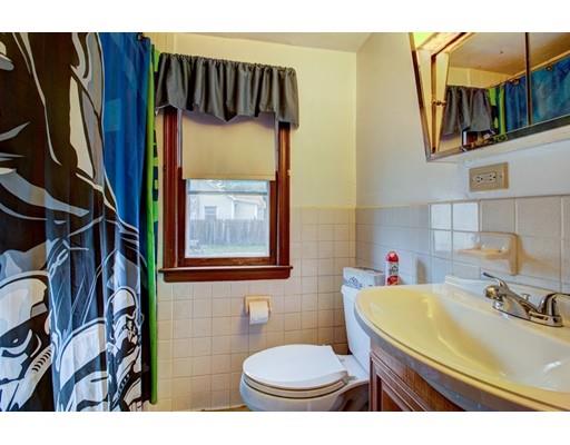 84 Campechi Street Springfield, MA 01104 - Photo 10 of 26 a bathroom with a sink and a mirror